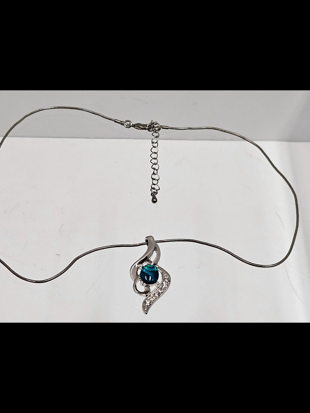 Silver-Tone Necklace with Teal Blue Glass Pendant